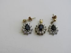 9ct gold, Zirconia & sapphire set of earrings & a pendant. Estimate £70-90.