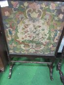 Victorian tapestry fire screen (behind glass) & a Victorian tapestry footstool, length 139cms.