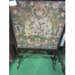 Victorian tapestry fire screen (behind glass) & a Victorian tapestry footstool, length 139cms.