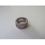 Silver, pink & white stone fashion eternity ring with 1 stone missing, size N. Estimate £20-30.