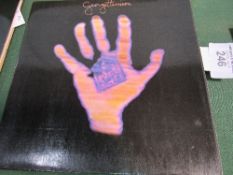 George Harrison LP 'Living in The Material World', 1973, in good condition. Estimate £15-30.