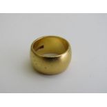 22ct gold band, weight 16gms, 1.00mm wide. Estimate £450-480.