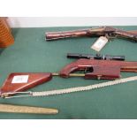 BSA Meteor .22 calibre air rifle with engraving, c/w telescopic sights. Estimate £25-40.