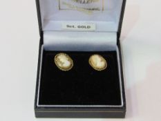 9ct gold cameo earrings in 'Remane' of Dublin box. Estimate £30-50.