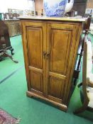 Cherry wood hi-fi cabinet, 59cms x 49cms x 102cms. Estimate £50-80.