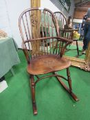Elm Windsor rocking chair. Estimate £80-100.