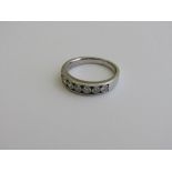 9ct white gold, 7 stone half eternity ring, size J, weight 3.2gms. Estimate £70-90.