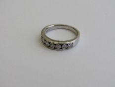 9ct white gold, 7 stone half eternity ring, size J, weight 3.2gms. Estimate £70-90.