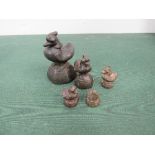 Set of 5 Burmese bronze opium weights in a Brahmani duck type hintha. Estimate £75-100.