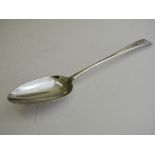 Irish silver serving spoon, hallmarked Dublin 1787, length 31cms. Estimate £80-120.