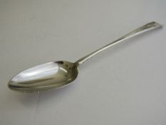 Irish silver serving spoon, hallmarked Dublin 1787, length 31cms. Estimate £80-120.