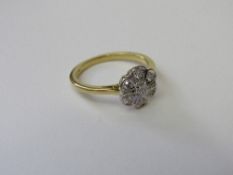 18ct gold & diamond flower set ring, size O 1/2, weight 3.9gms. Estimate £250-300.