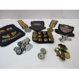 2 WWI medals, qty of white metal & brass military buttons & 3 pocket badges. Estimate £30-50.