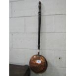 Copper bed warming pan. Estimate £5-10.