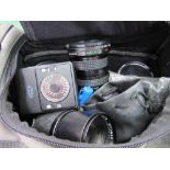 Canvas bag containing Soligor lens, Canon lens & a qty of filters. Estimate £30-50.