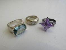 3 fashion rings. Estimate £10-20.