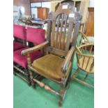 18th century oak framed open hall armchair. Estimate £30-50.