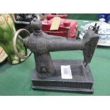 Haberdashery shop display model of a small sewing machine. Estimate £15-20.