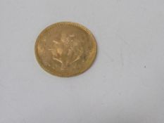 Mexican 1955 5 Pesos gold coin. Estimate £100-120.
