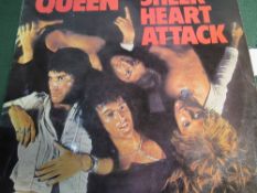 3 Queen records: Sheer Heart Attack, A Night at the Opera & A Day at the Races, 1974-1976.