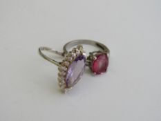 2 silver rings with amethyst & topaz stones, both size Q. Estimate £25-35.