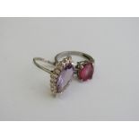 2 silver rings with amethyst & topaz stones, both size Q. Estimate £25-35.