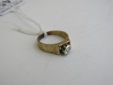 18ct gold (tested) solitaire diamond ring, size M. Estimate £60-80.