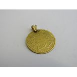 Islamic coin pendant. Estimate £20-30.