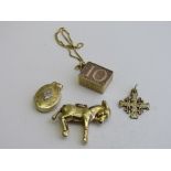 2 9ct gold charms, 9ct gold locket & a 9ct gold bracelet & charm. Estimate £150-180.