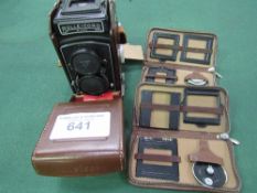 Rolleicord DBP DBGM cine camera in leather case, complete with accessories. Estimate £50-80.