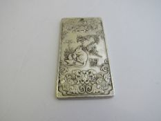 Chinese silver coloured ceremonial plaque, 9.5cms x 5cms. Estimate £20-40.