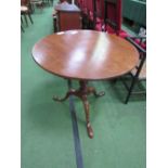 Mahogany pedestal tilt-top table on pad feet, 75cms diameter. Estimate £20-40.