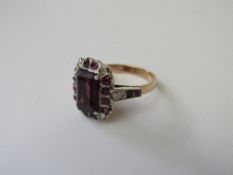 Rose gold coloured large gem set ring, size P 1/2, weight 5.5gms. Estimate £150-200.