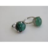 2 silver & green stone rings, both size Q. Estimate £20-30.