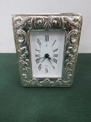 Hallmarked silver framed clock, going. Estimate £25-40.