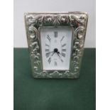 Hallmarked silver framed clock, going. Estimate £25-40.