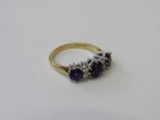 18ct gold, amethyst & diamond ring, size N, weight 4.3gms. Estimate £350-400.