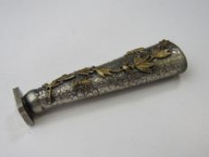 Japanese style silver metal stamp with gold coloured metal decoration of leaves. Estimate £40-60.