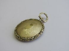 Gold coloured metal antique mourning pendant, length 5.5mm. Estimate £250-300.