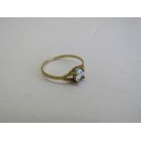 18ct gold (tested) aquamarine ring, size L. Estimate £20-30.