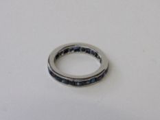 White gold or platinum & sapphire eternity ring, size M 1/2, weight 4.1gms. Estimate £250-300.