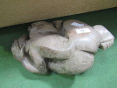 Carved stone African sculpture of loving couple. Estimate £100-150.