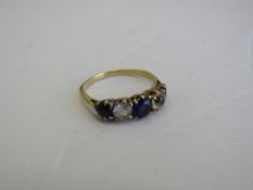 9ct gold (tested) blue & white stone ring, size K. Estimate £40-60.