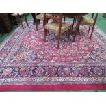Inraman made red ground carpet, 290 x 290. Estimate £50-80.