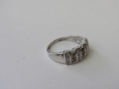 White metal pave diamond set ring, size O, weight 3.2gms. Estimate £100-120.