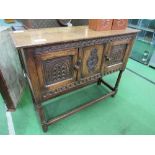 Oak cupboard with carved doors & rail, 106cms x 37cms x 86cms. Estimate £50-70.