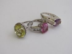 3 silver rings with sapphire, amethyst & citrine stones, size Q, Q & R 1/2. Estimate £30-50.
