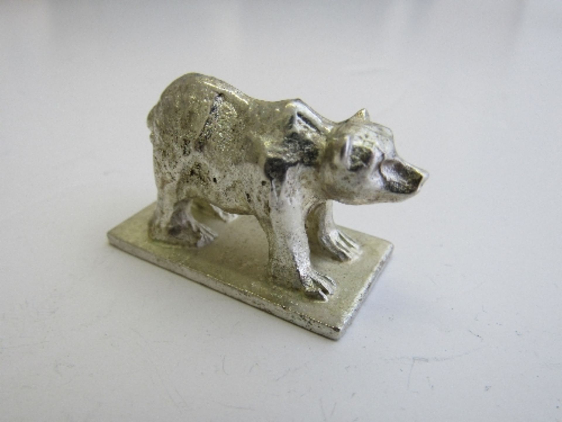 Bier of Israel silver figurine - bear. Estimate £20-25.