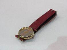 Must de Cartier quartz gold plated wristwatch with red leather strap, good working order.