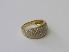 18ct gold pave set diamond ring, signed BB, size O, weight 6.1gms. Estimate £400-500.